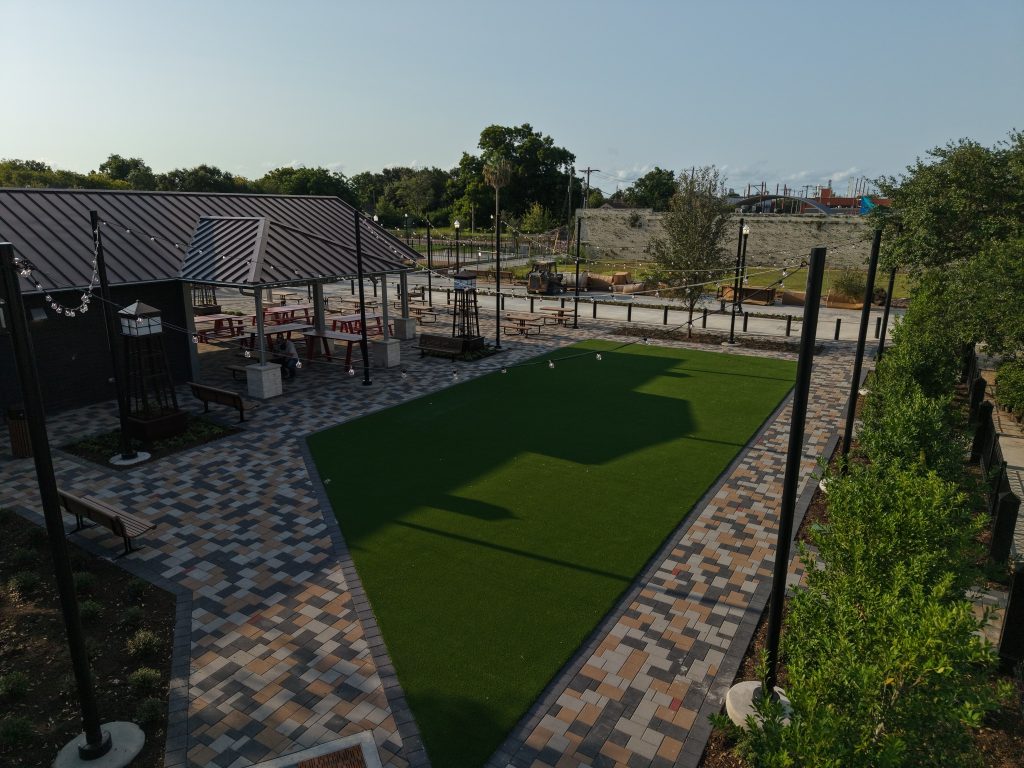 The newly built Texas City Community Plaza on 6th Street featuring pedestrian paths, landscaping, and public pavilions.